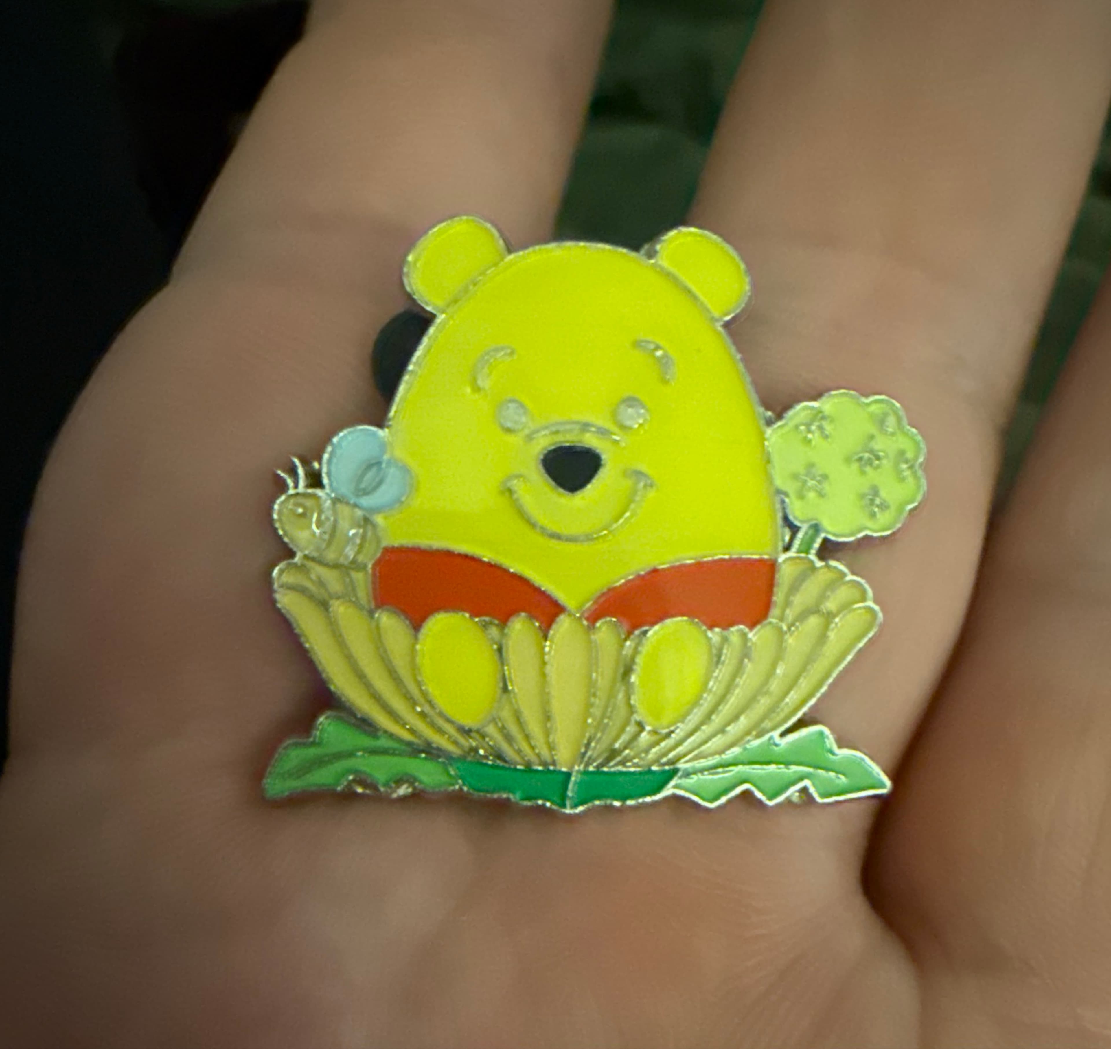 Winnie the Pooh in a Flower Garden with Bee