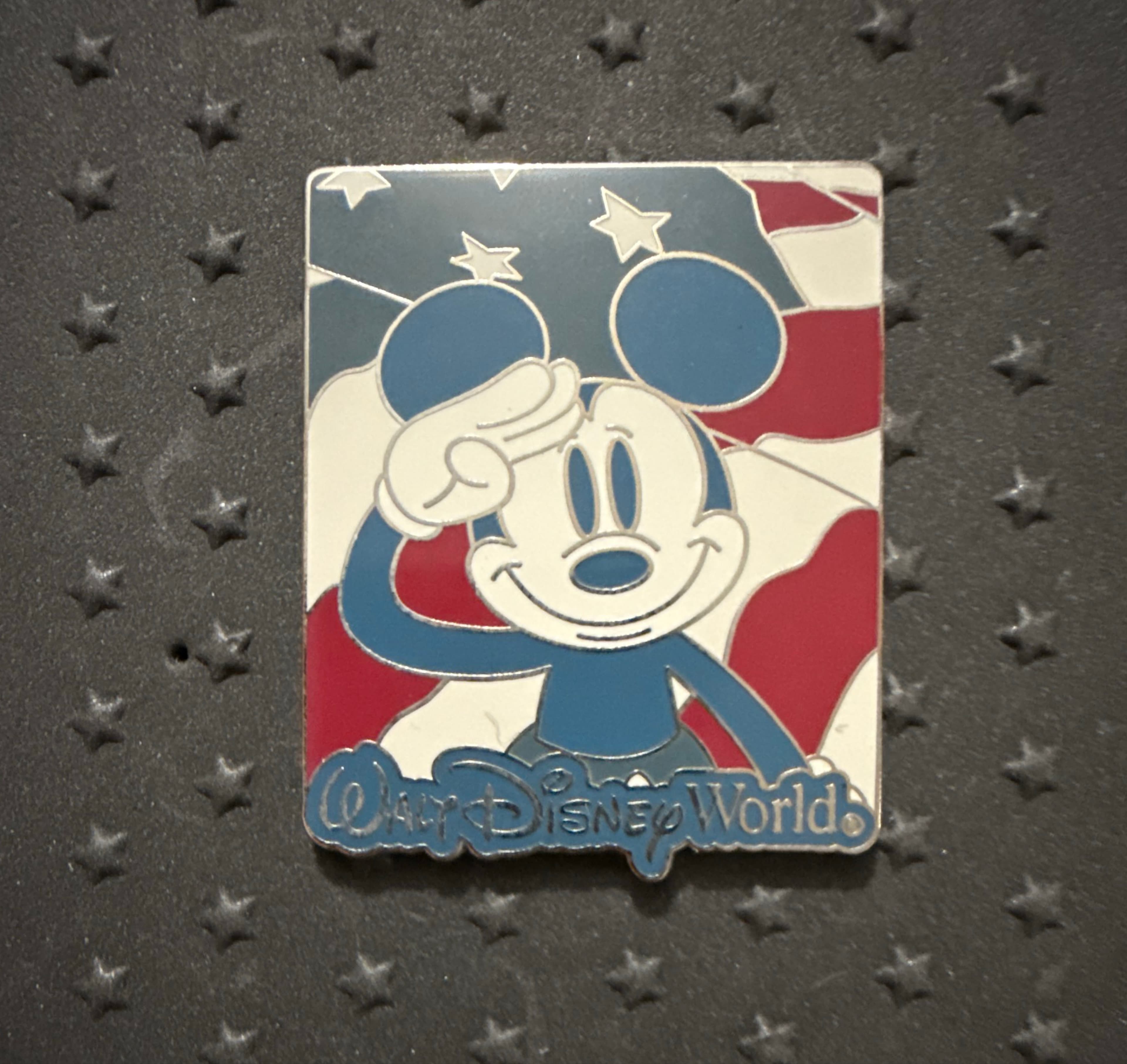 Mickey Mouse Saluting with the American Flag Behind Him