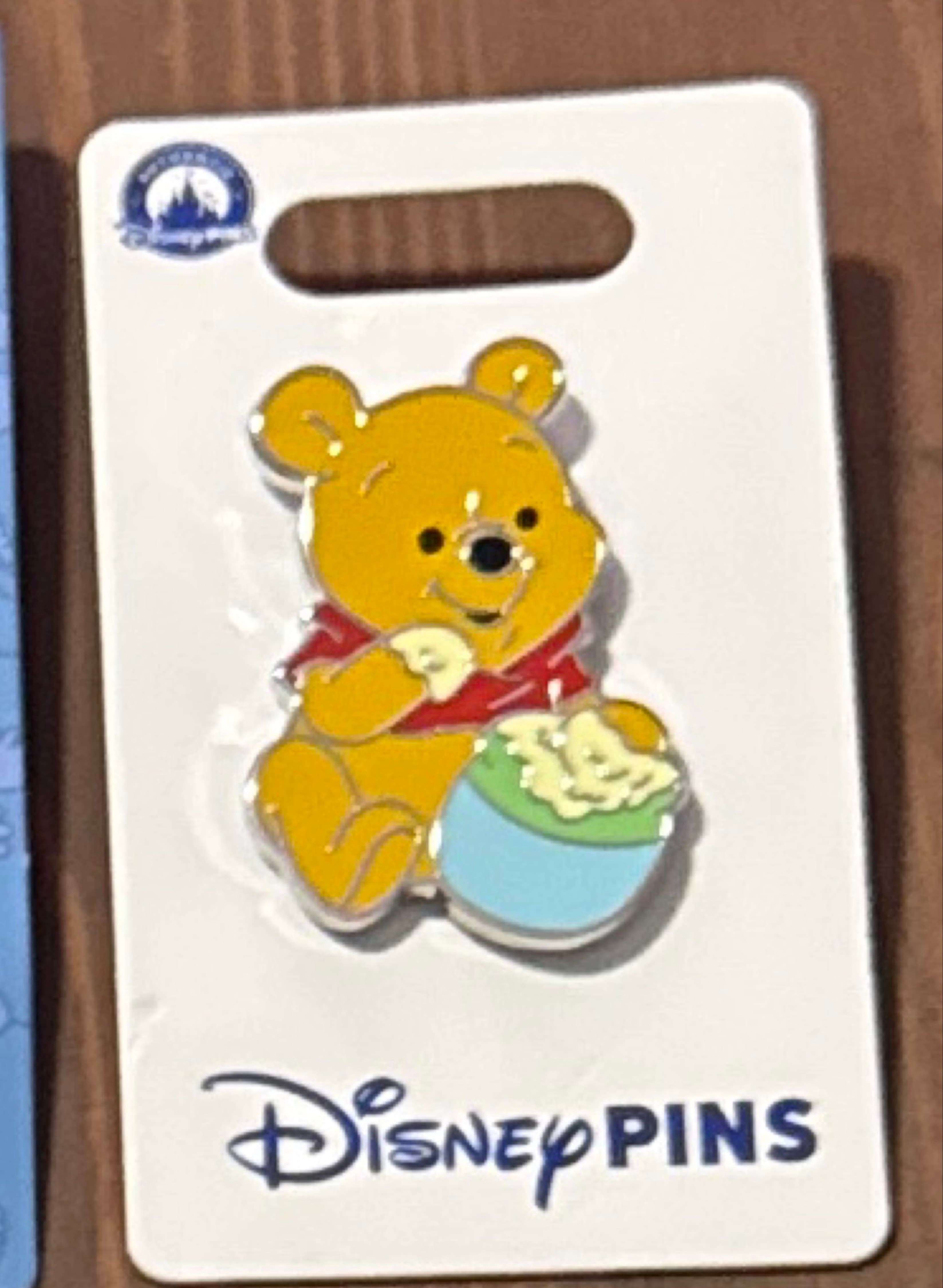 Baby Winnie the Pooh Eating Honey from a Hunny Pot