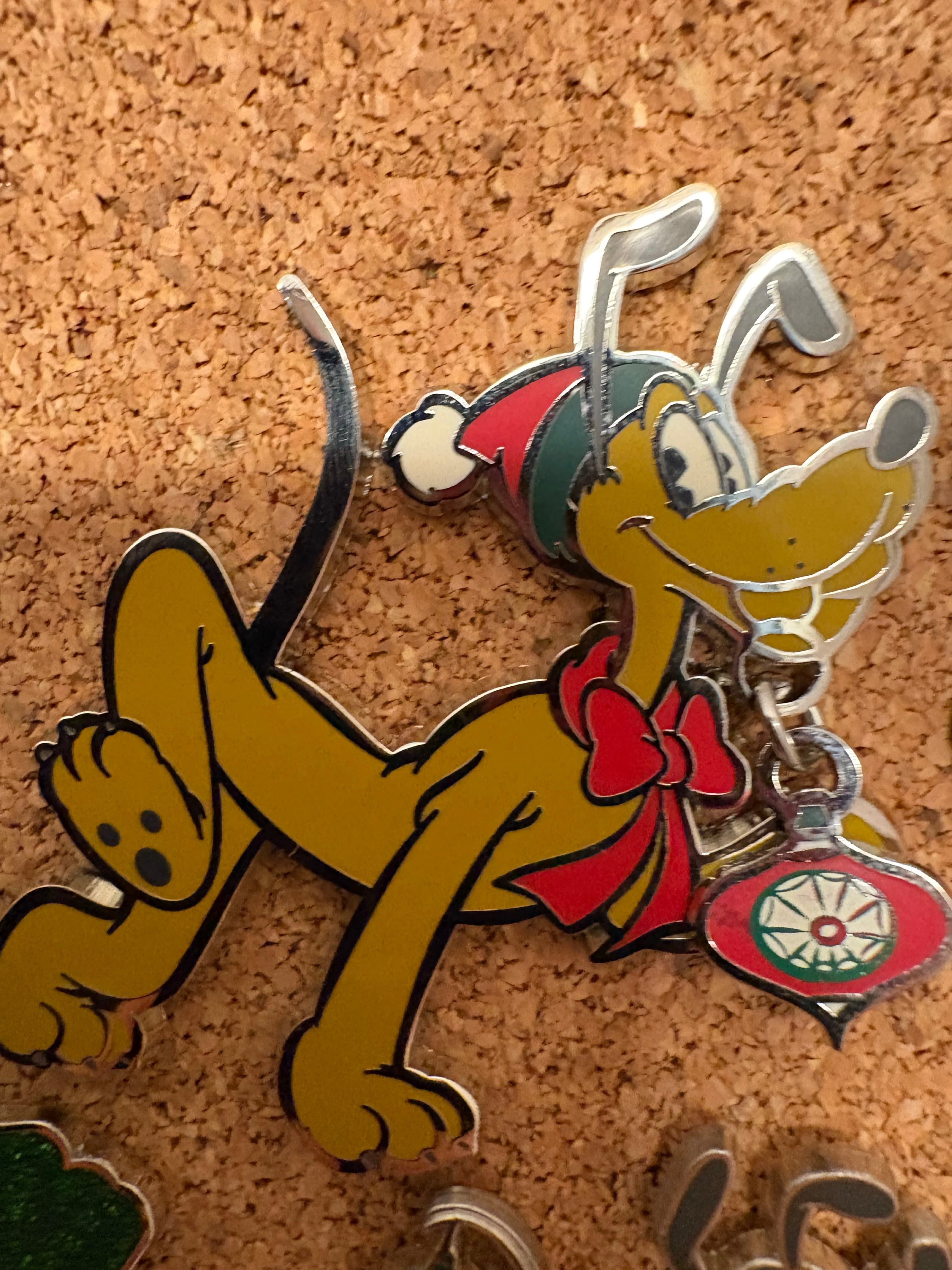 Pluto with Christmas Ornament and Santa Hat