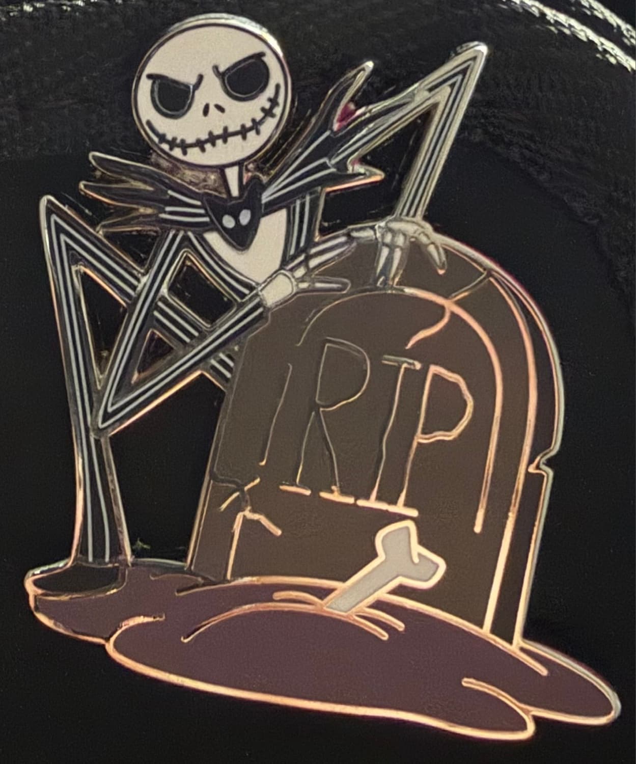 Jack Skellington behind R.I.P. Grave