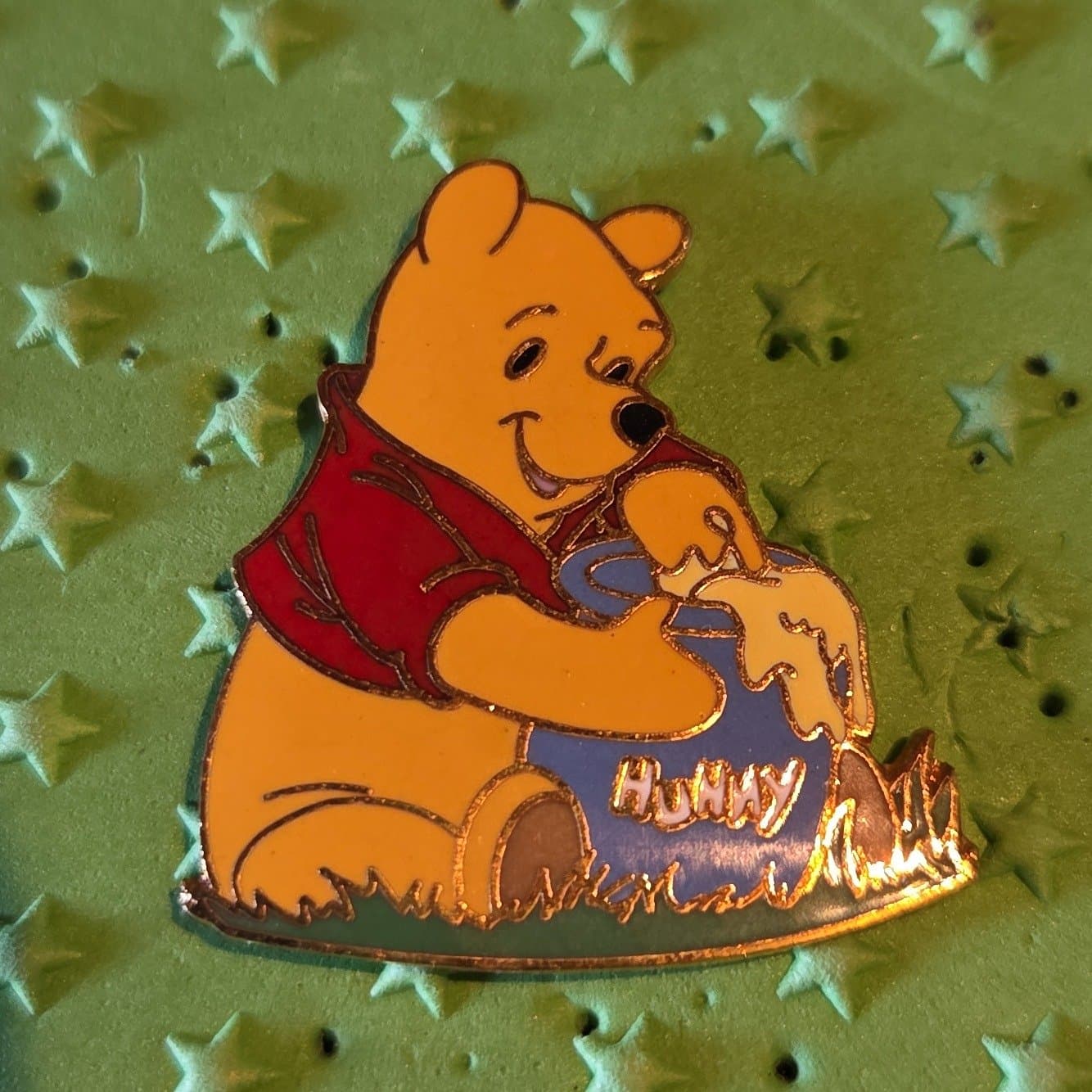 Winnie the Pooh Eating from Hunny Pot
