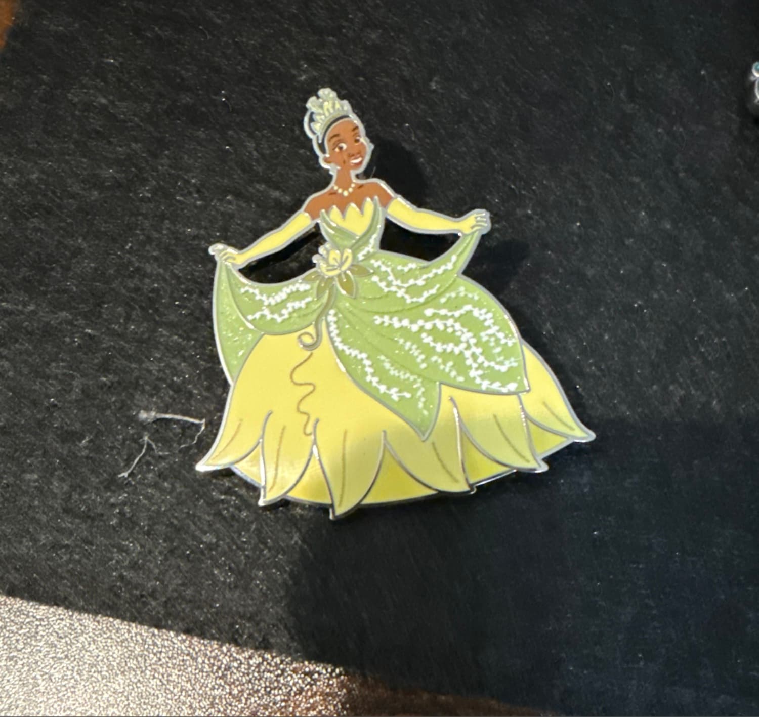 Tiana Holding Green Dress