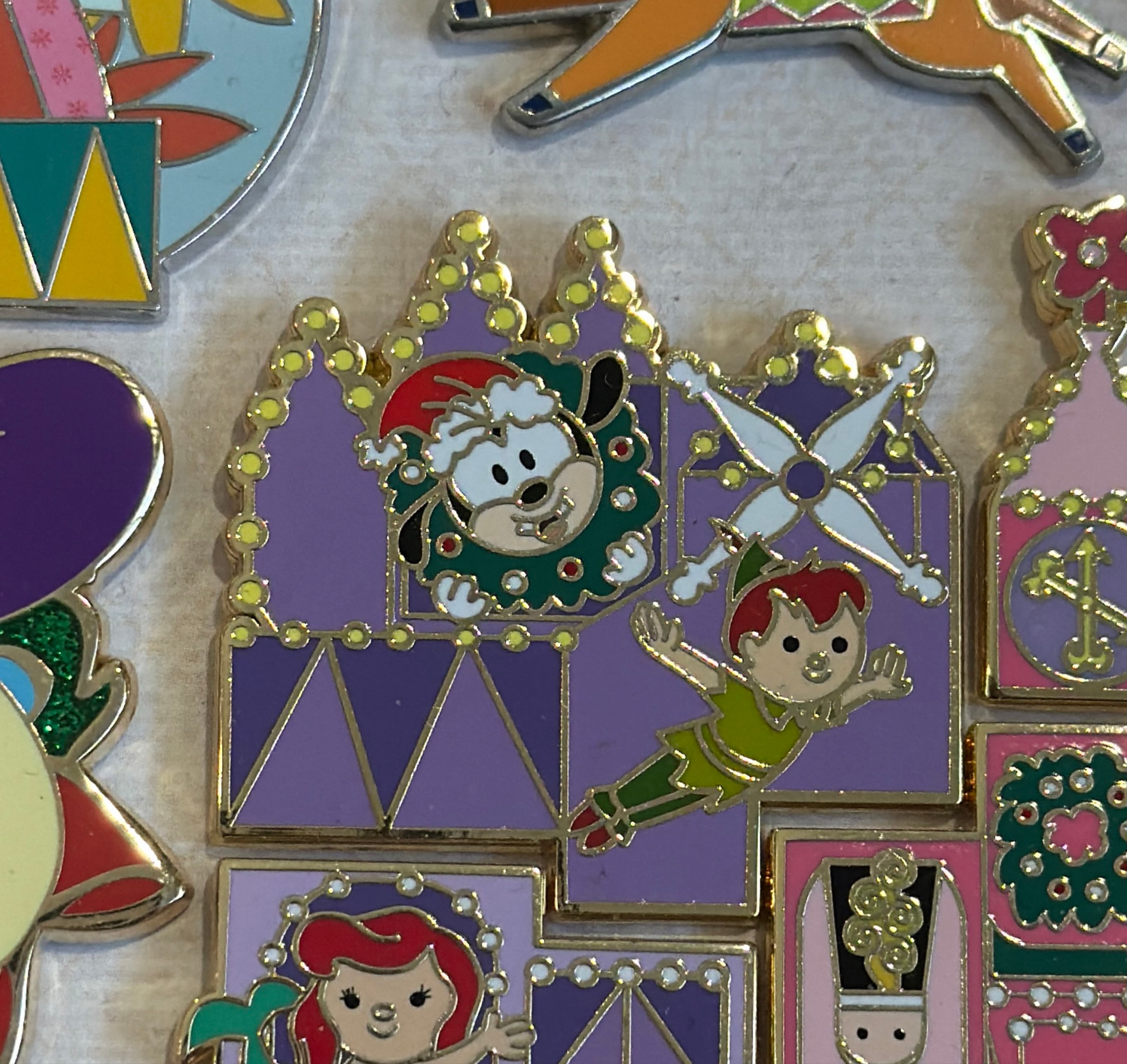 It's a Small World Holiday Mystery Pin Set 2022