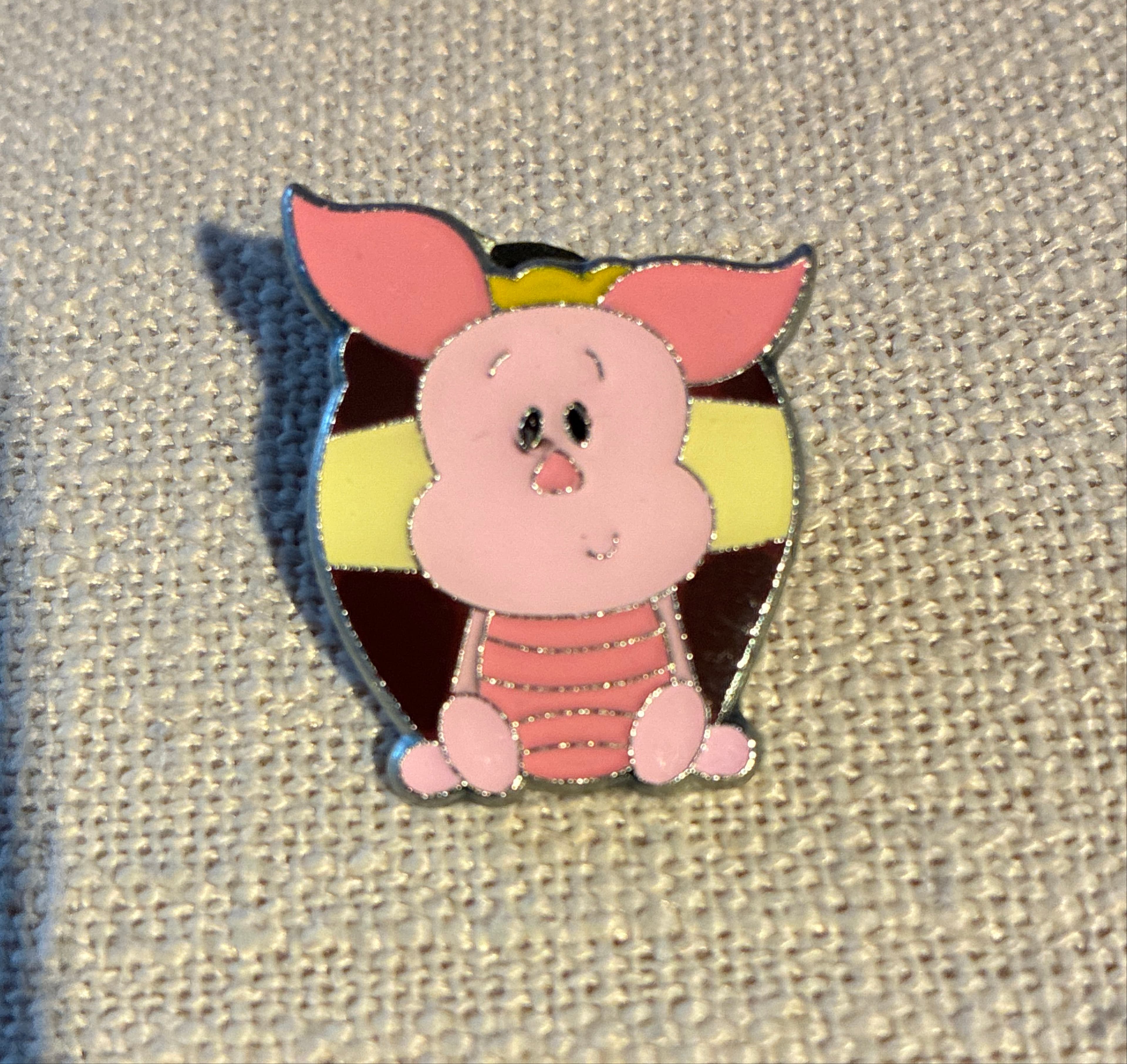 Piglet with Crown on Striped Honey Pot Background