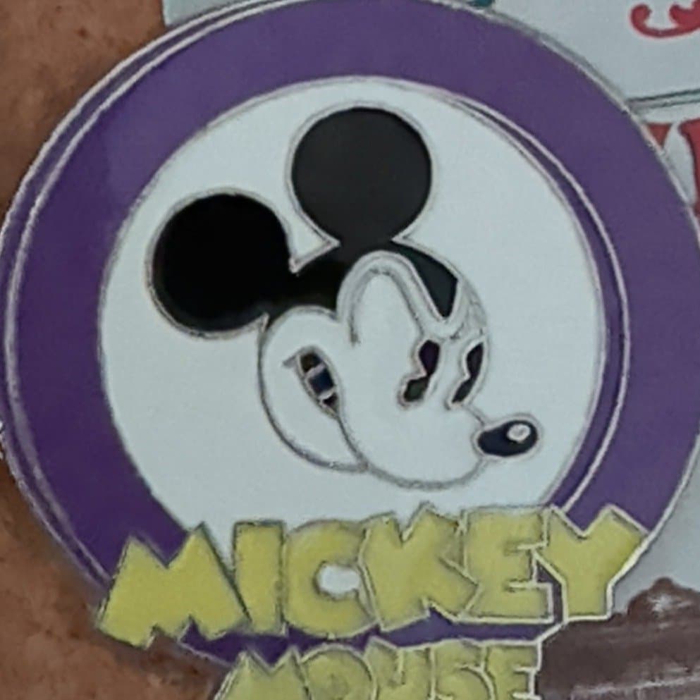 Mickey Mouse Head Purple Circle with Yellow Text