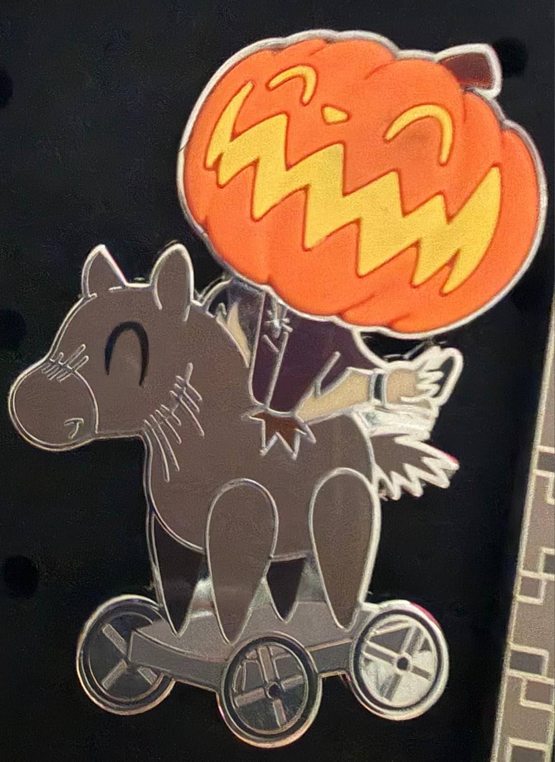 Headless Horseman on Toy Horse Pin