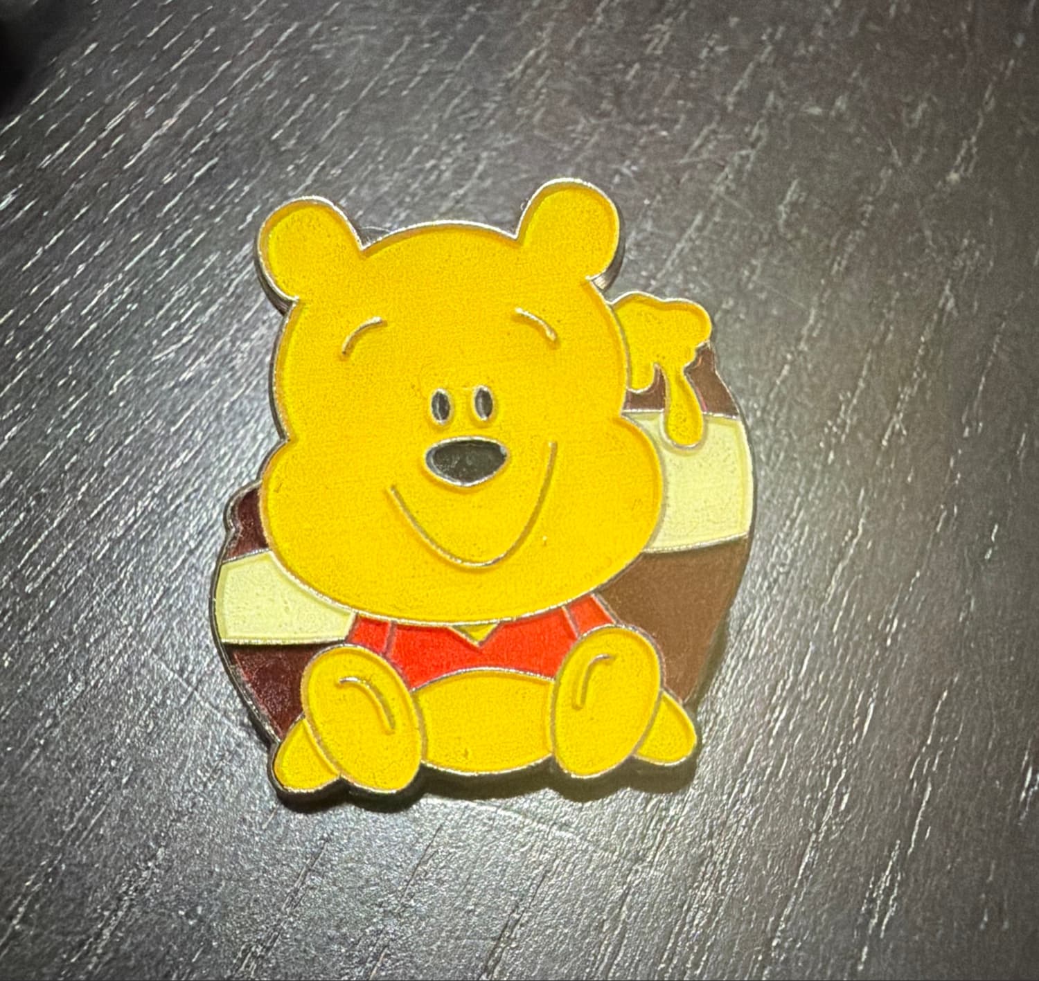Winnie the Pooh - Pooh Sitting and Eating Honey (Hunny)