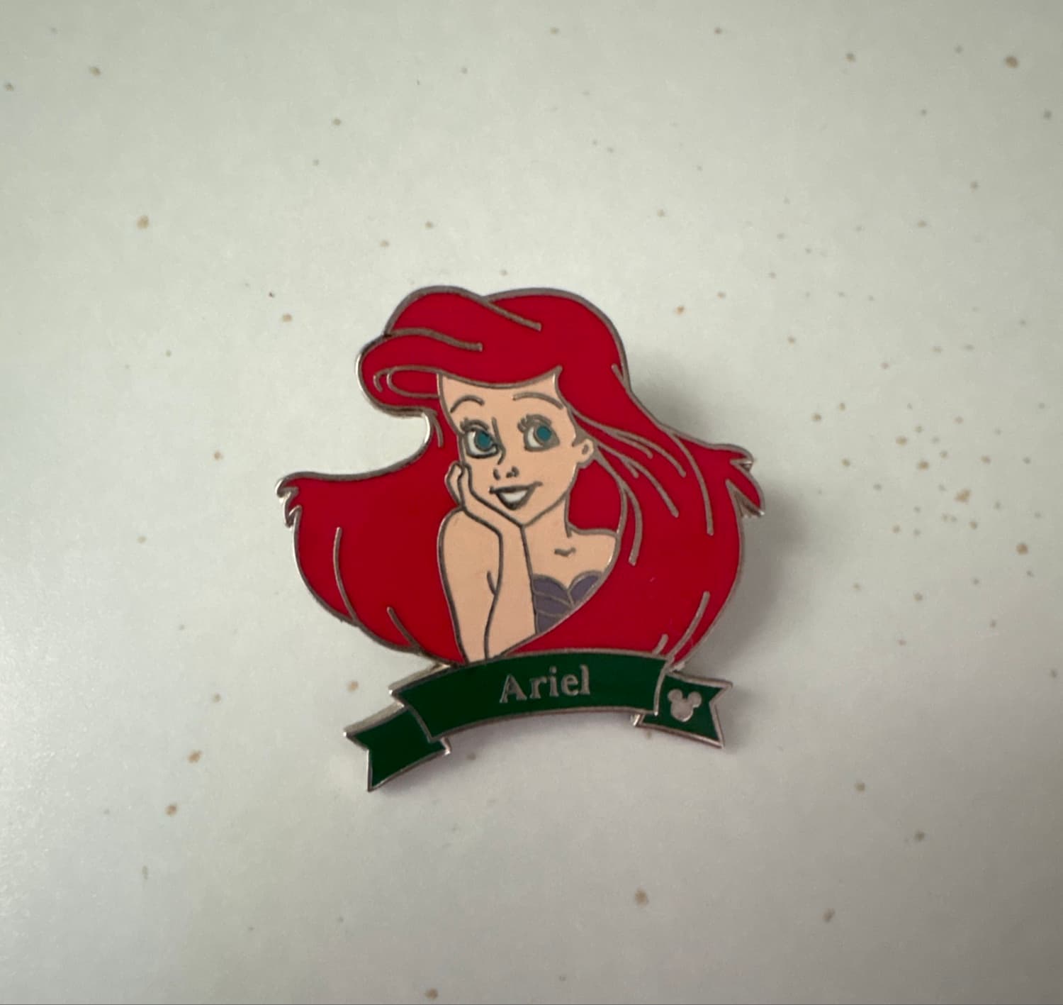 Ariel Hidden Mickey Green Ribbon Name Pin
