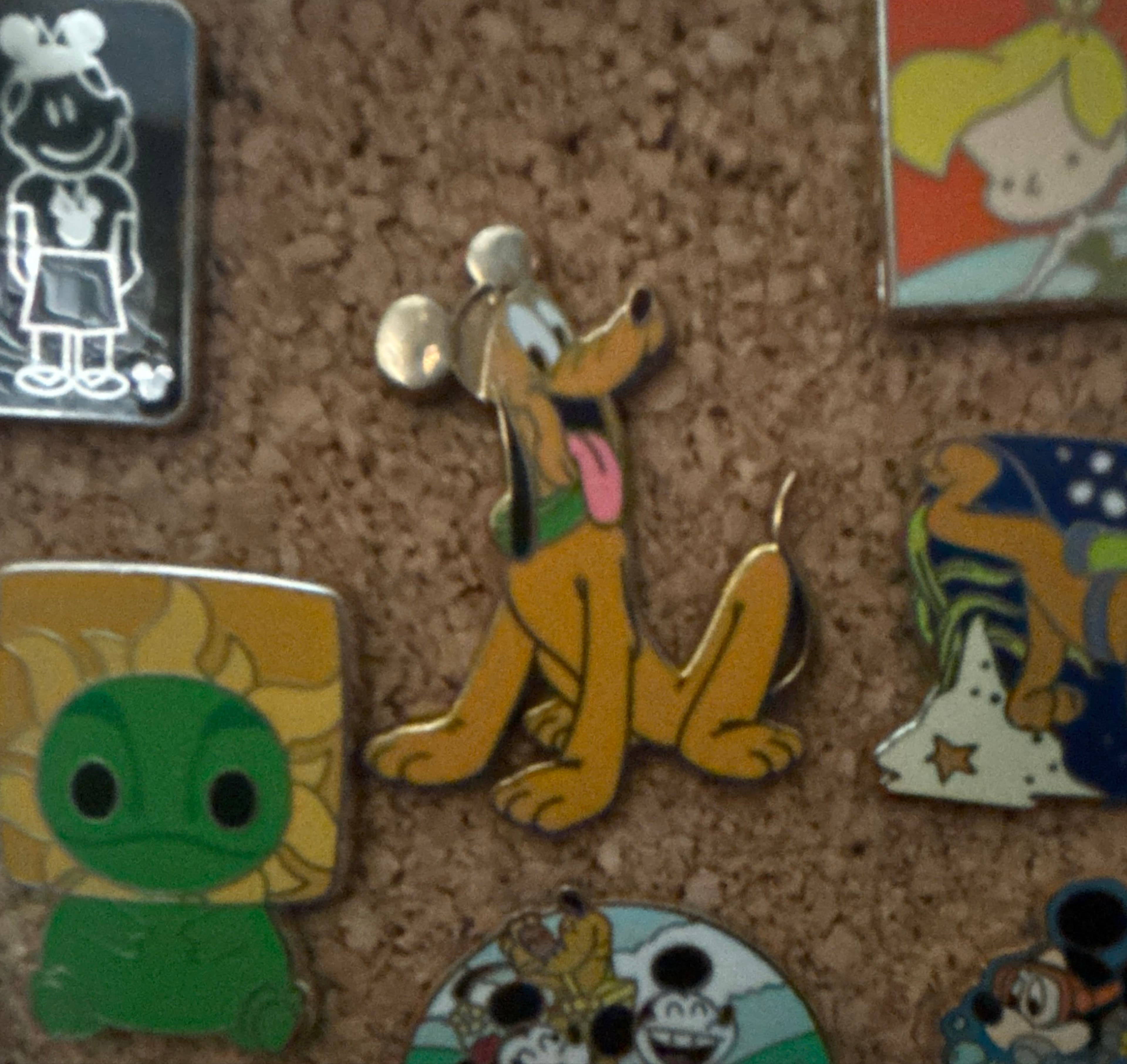 Pluto Sitting with Left Ear Up