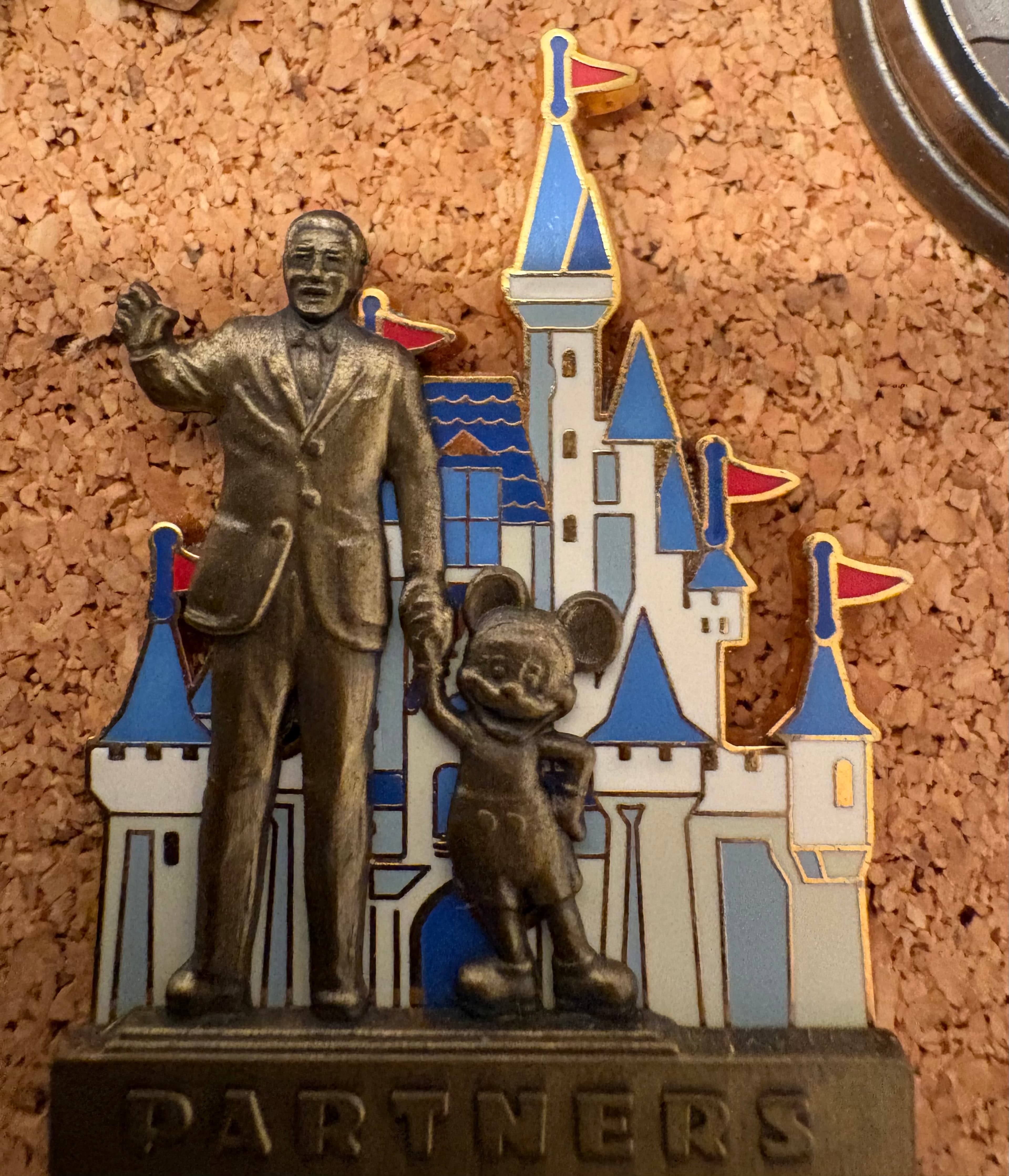 Walt Disney and Mickey Mouse in front of Cinderella's Castle