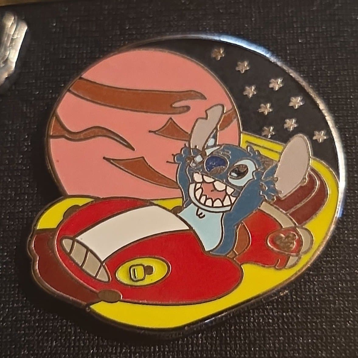 Stitch in his red hover car