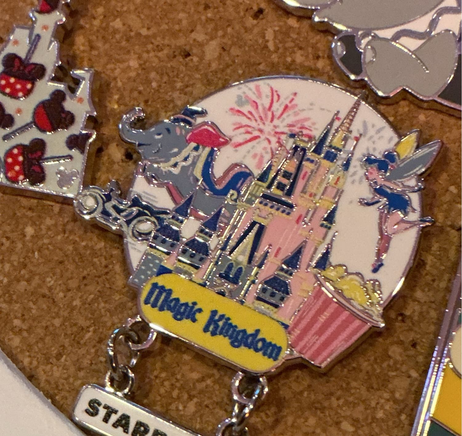 WDW Starbucks Discovery Series Magic Kingdom Pin with Dumbo, Tinker Bell, Cinderella Castle, and TRON front