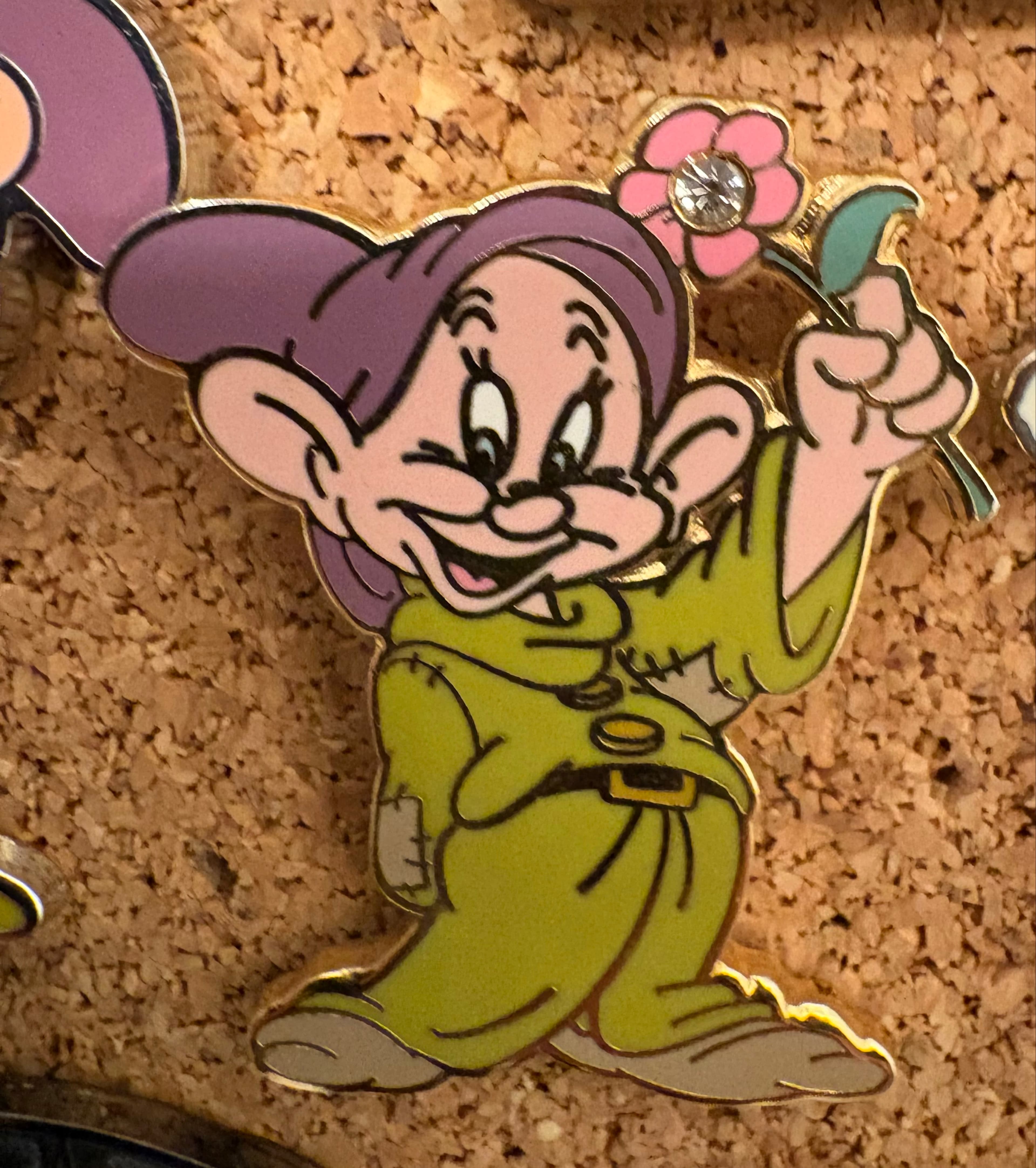 Dopey Holding a Pink Flower