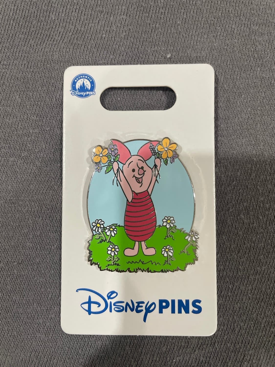 Piglet Poses with Flowers front