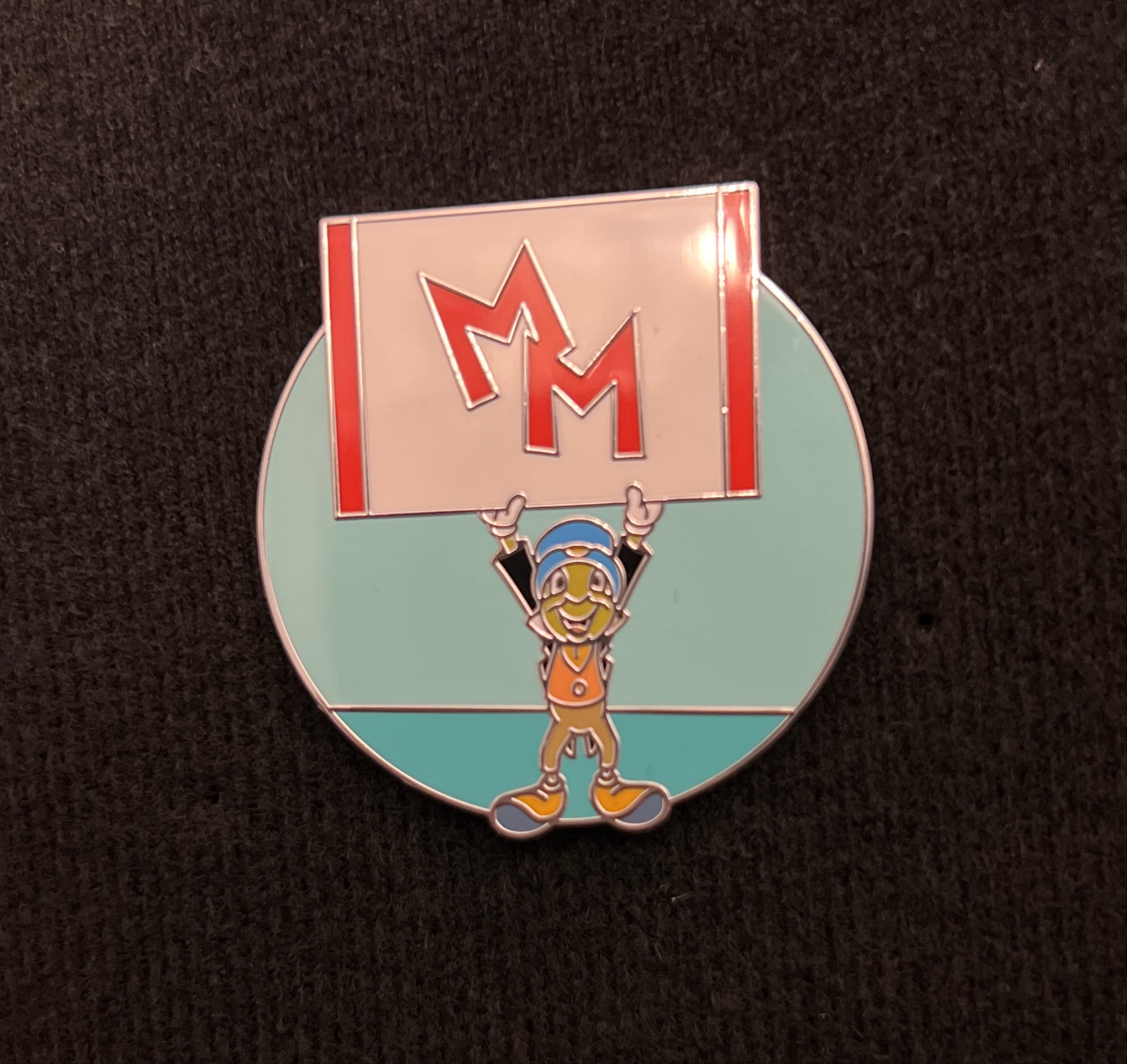 Jiminy Holding 'MM' Sign - Mickey Mouse Club Mystery Collection front