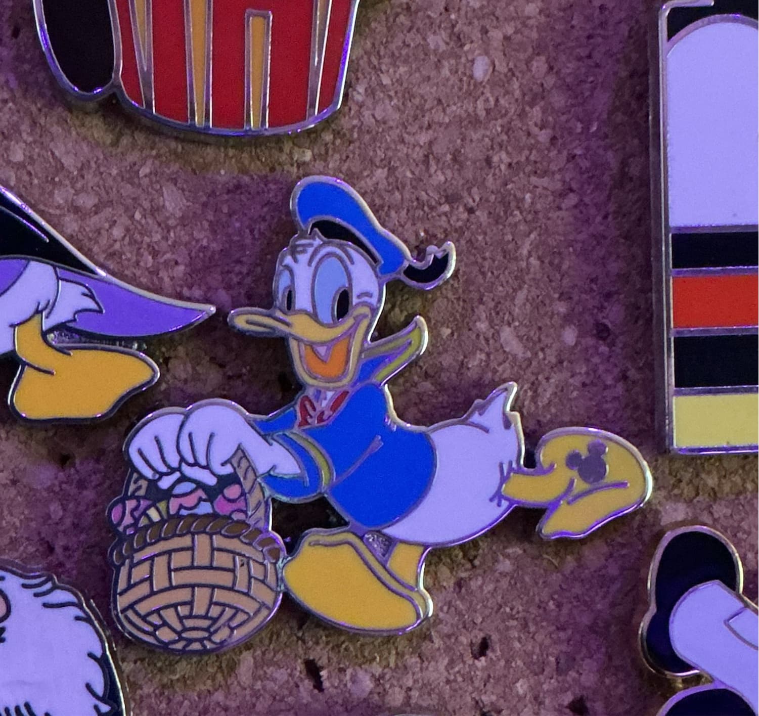 Donald Duck Easter Basket Hidden Mickey Pin front