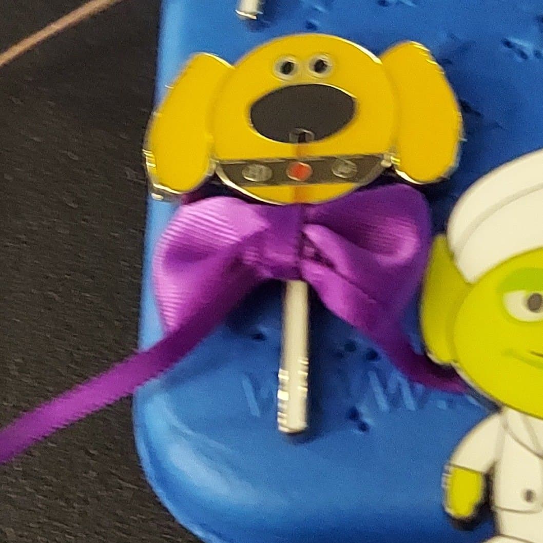 Dug (Up) Stylized Head with Purple Ribbon front