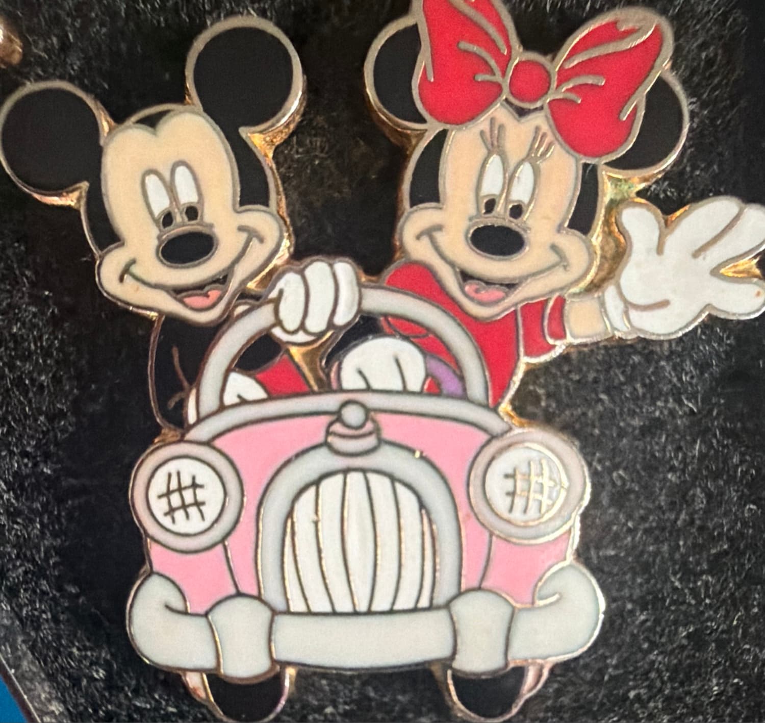 Mickey and Minnie in a Pink Car
