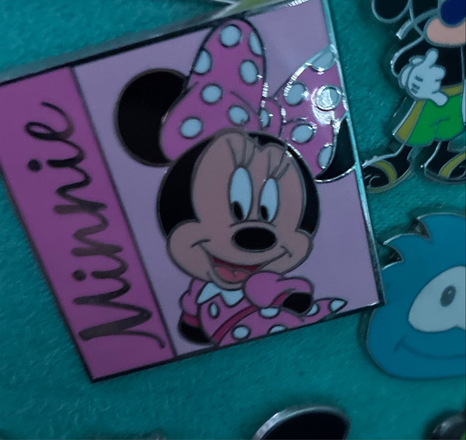 Minnie Mouse reading pink book