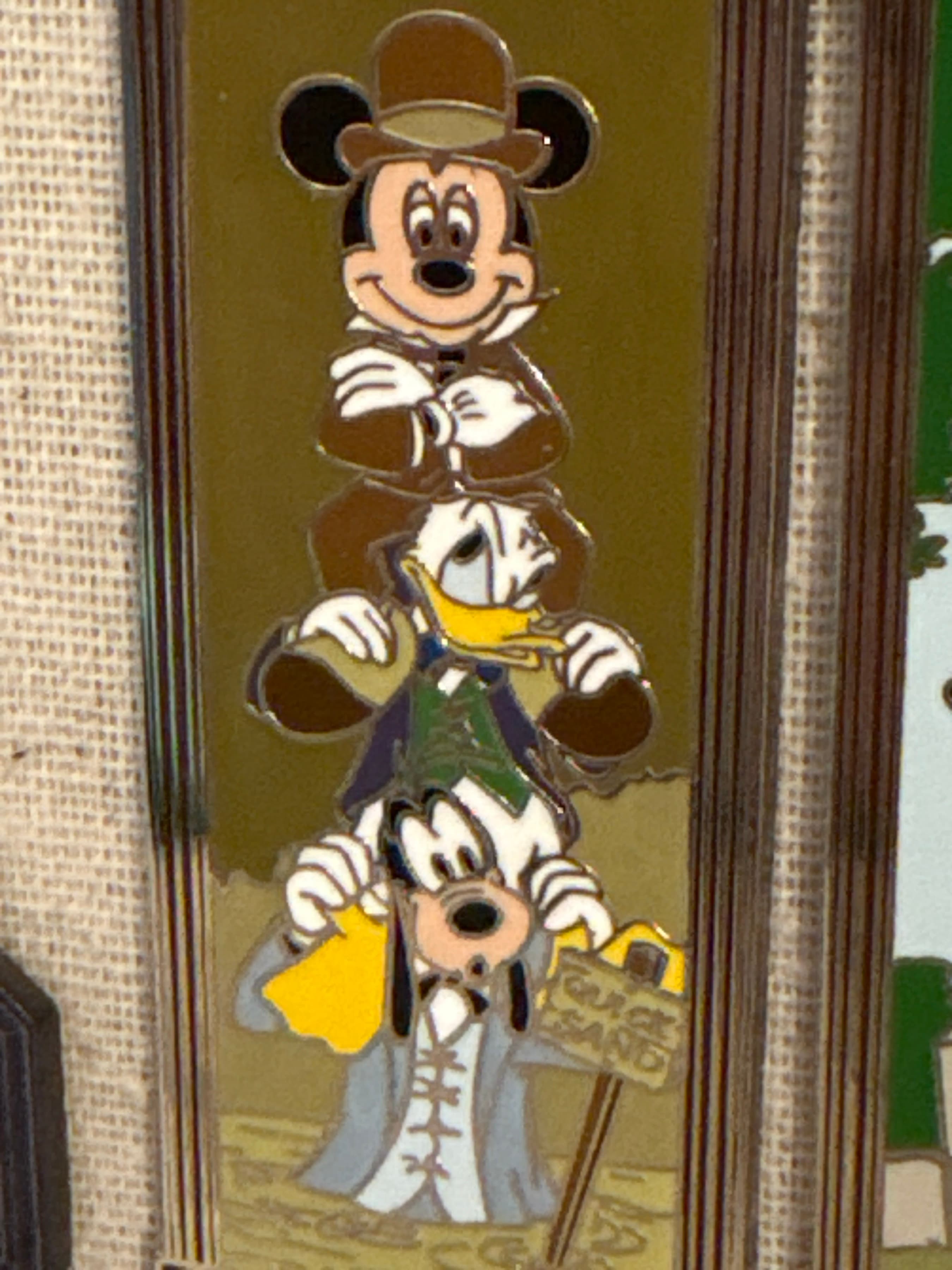Characters in Stretching Portraits - Mickey, Donald, and Goofy in Quicksand - Haunted Mansion