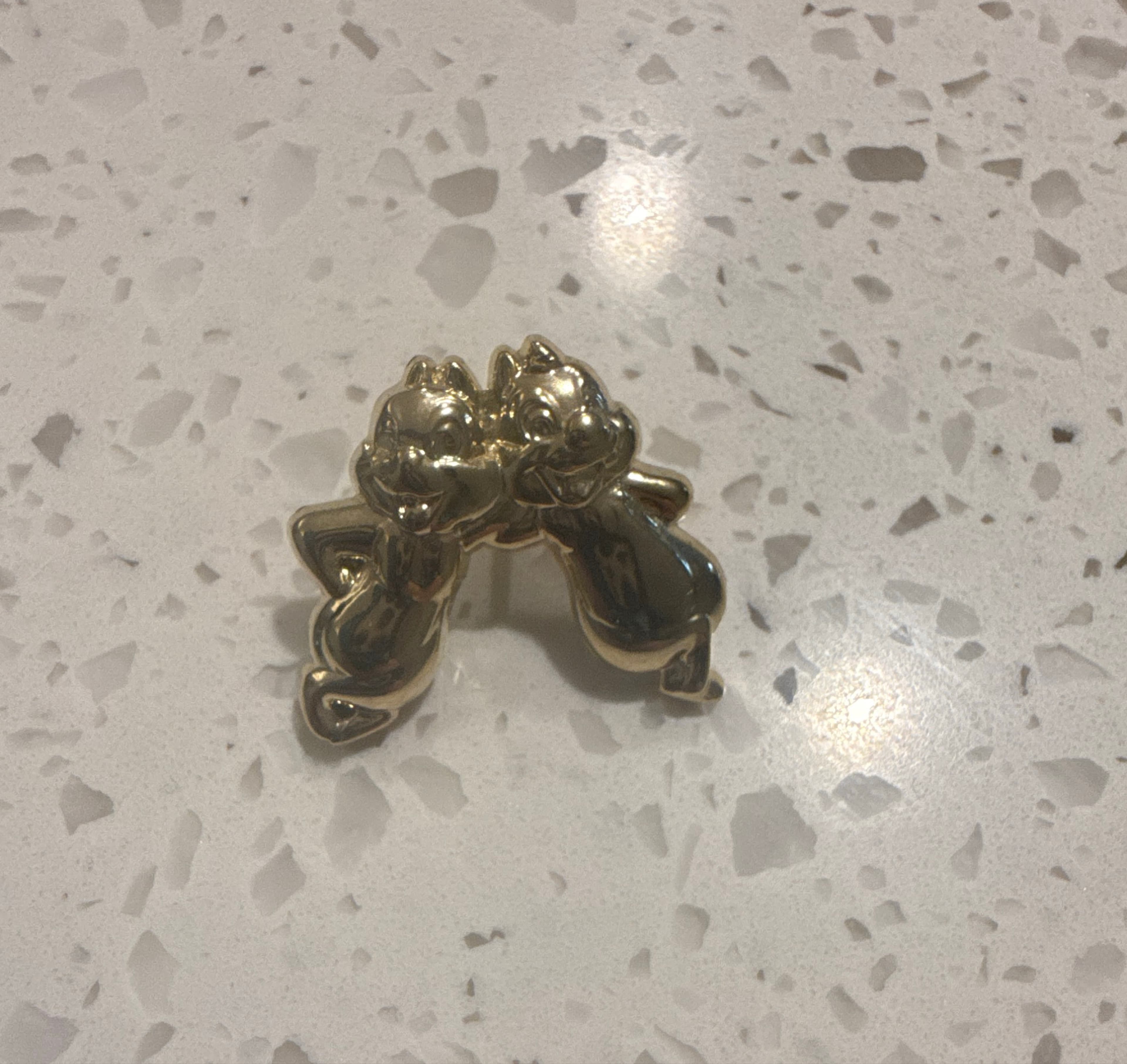 Chip and Dale 50th gold statue