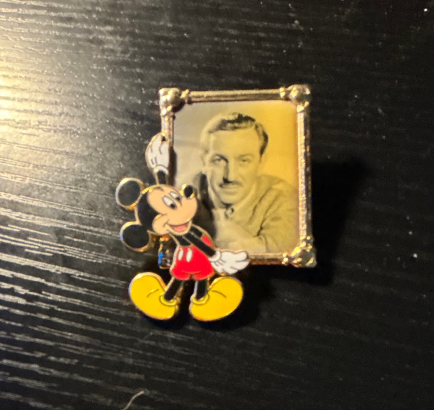Mickey Mouse Holding Portrait of Walt Disney