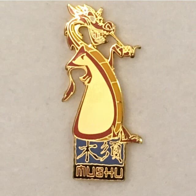 Mushu Standing on Sign